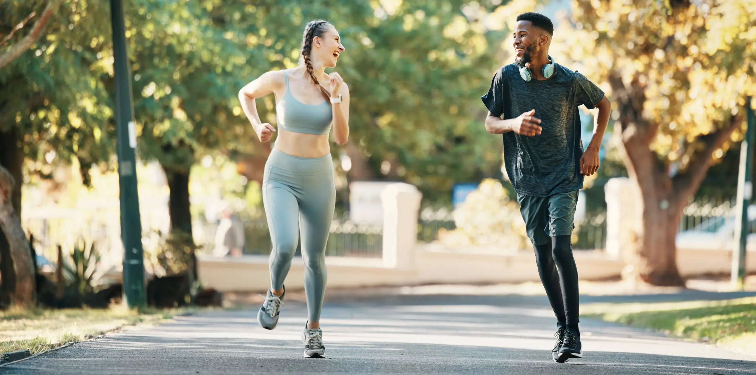 FitnessParkDiversityAndRunningCoupleWorkoutForCardioHealth