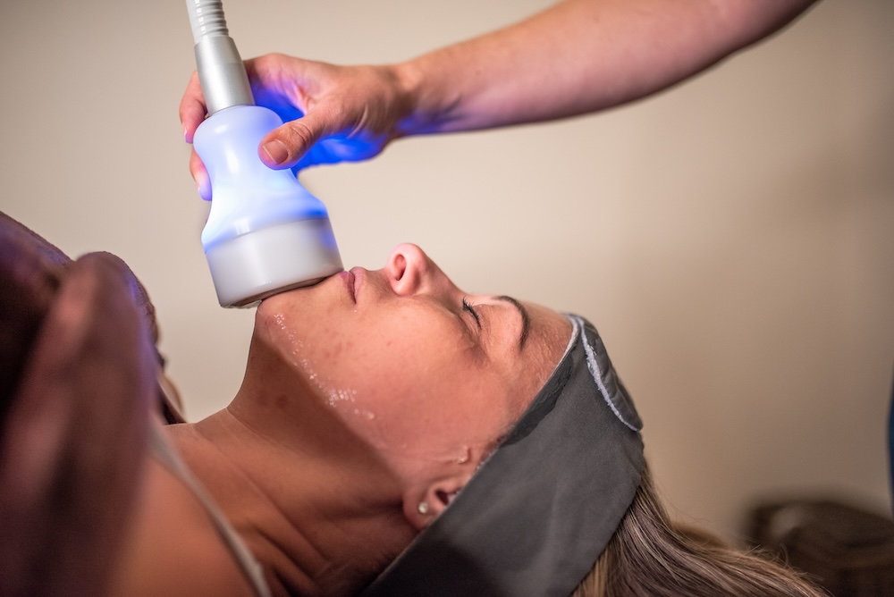 Woman receiving Cryo Face Treatment at Sloco in San Luis Obispo